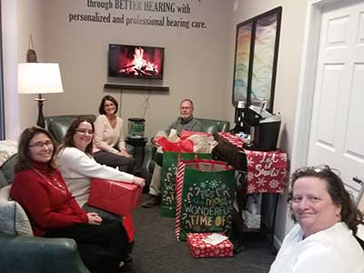 Team holiday photo gift exchange